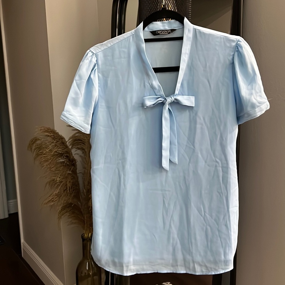 Light blue short-sleeve blouse